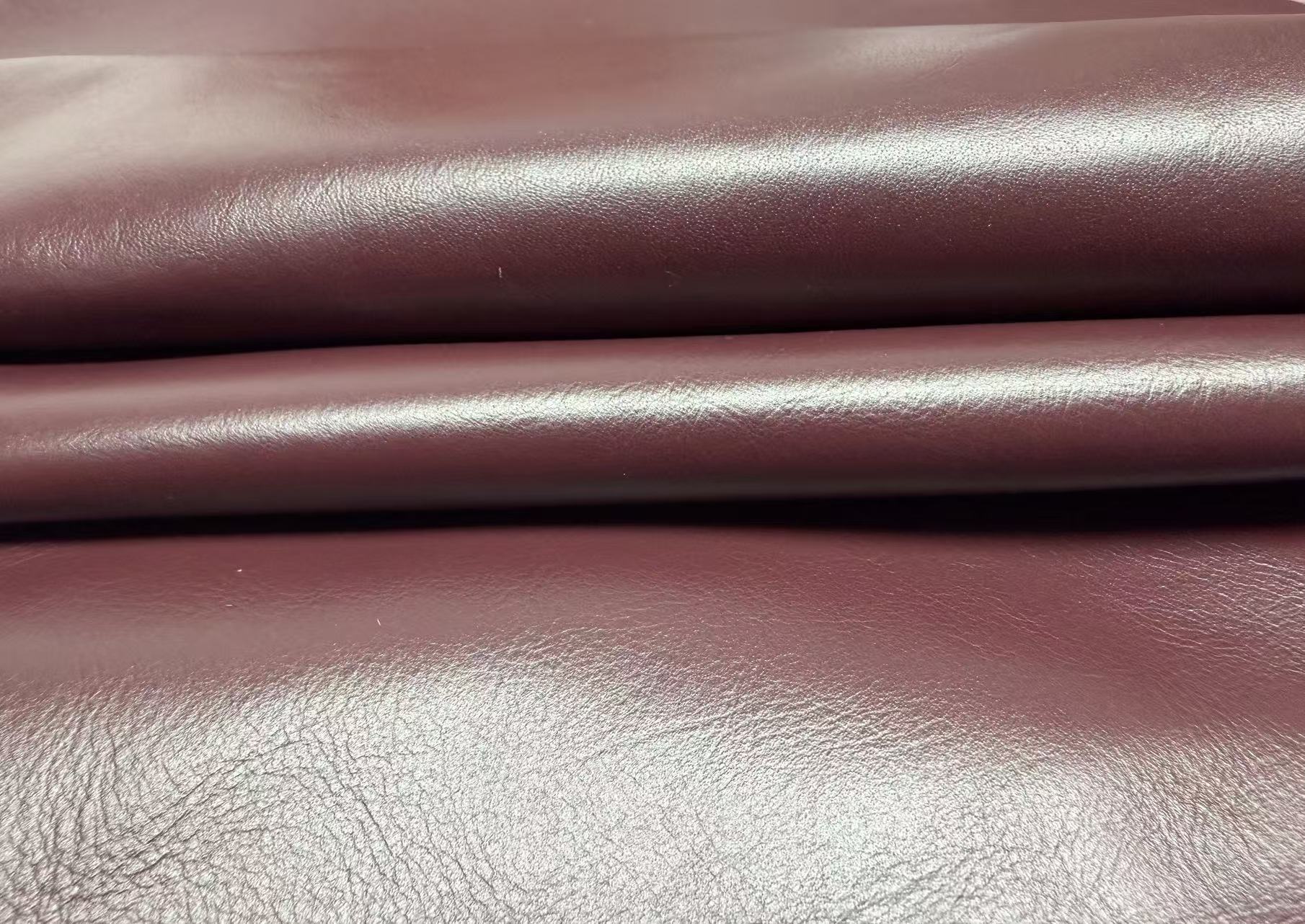 Burgundy Sauvage leather, photograph supplied by FRAYDA